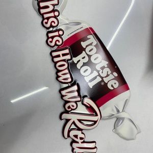 Die cut tootsie roll sign